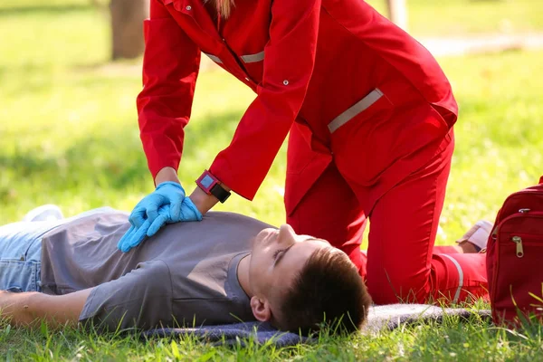 Depositphotos 221078274 Stock Photo Woman Uniform Performing Cpr Unconscious